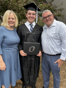 Kyle Cottone '25, poses for a photo at his spring 2026 graduation at Baxter Arena in Omaha, NE.
